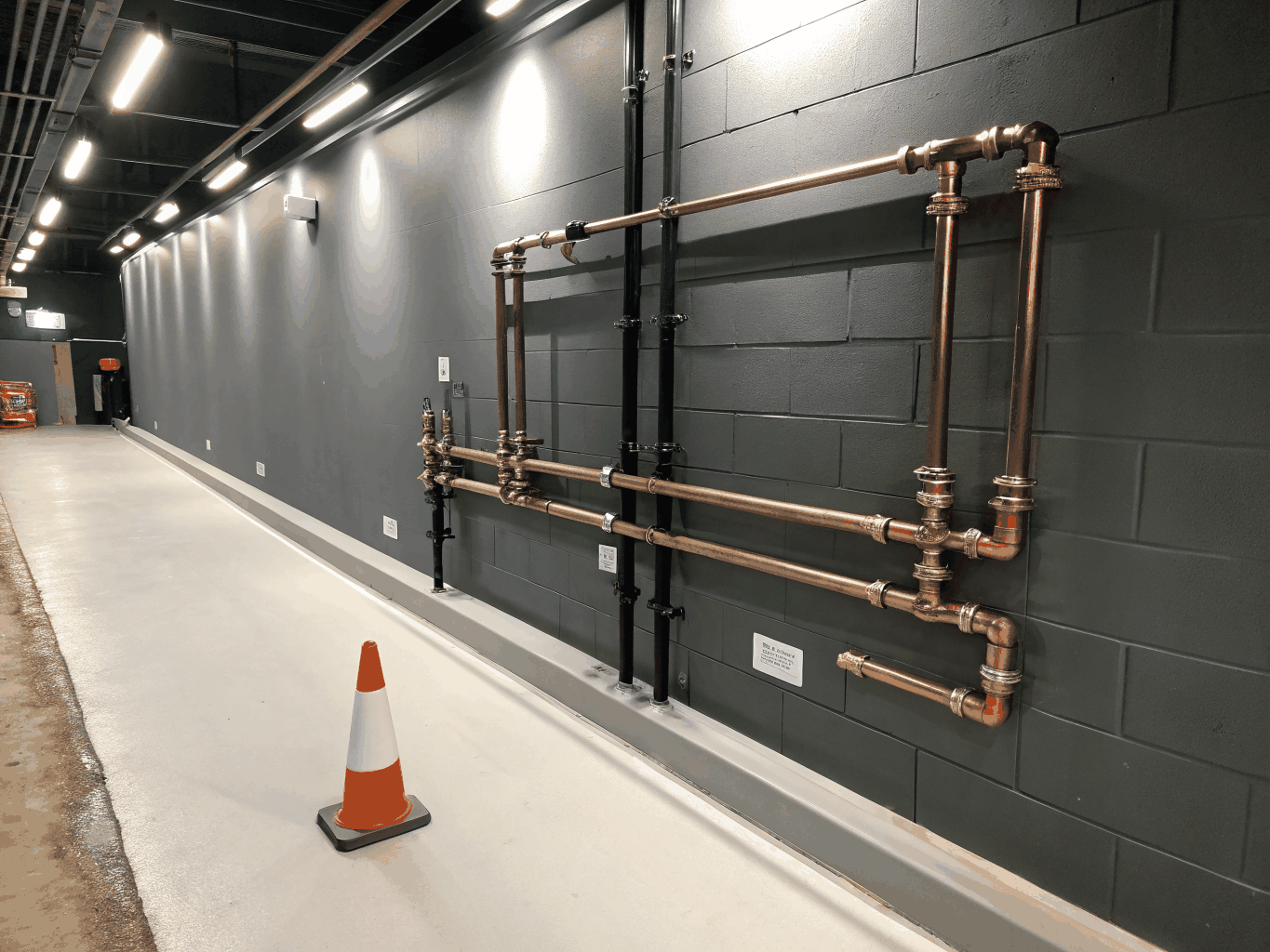 Precision commercial PEX plumbing manifold system installation in Athens TX